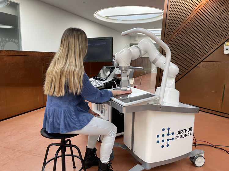 Sonification to Increase Trust and Improve UX in Human-Robot Interaction